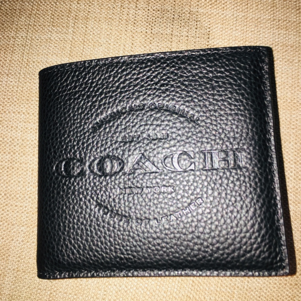 Men’s black & tan coach wallet, w/tags authentic